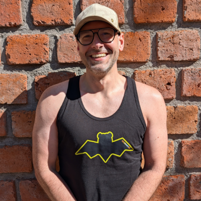 Julien in the Bat Bear Tank Top